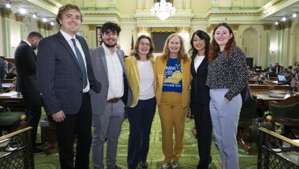 Assemblymembers Gail Pellerin and Dawn Addis presents Banana Slug Art Contest Winners on Assembly Floor
